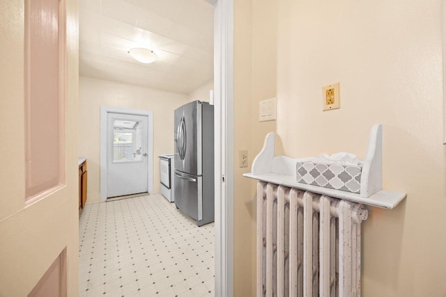 103 E Rollin St, Edgerton, WI 53534 - hall featuring radiator and light flooring
