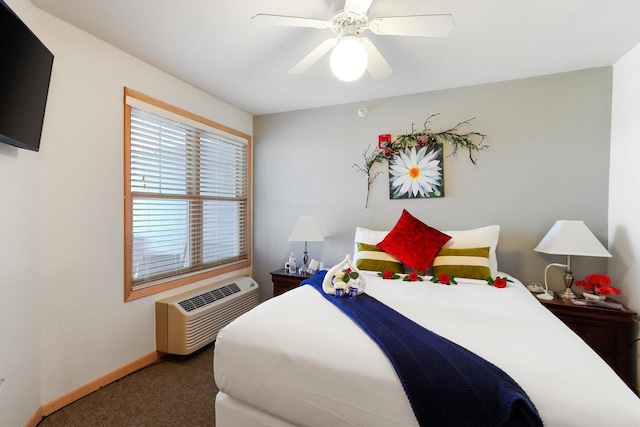 123 Center St Unit 301, Lake Geneva, WI 53147 - bedroom featuring carpet, baseboards, ceiling fan, and a wall mounted air conditioner