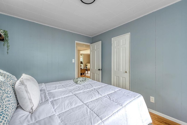 201 N Hillside Ter, Madison, WI 53705 - bedroom with wood finished floors and crown molding