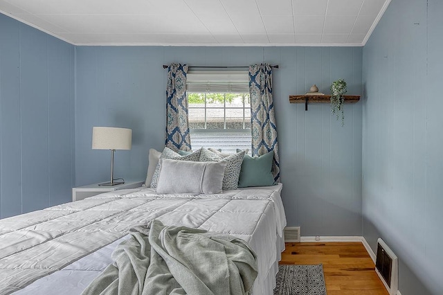 201 N Hillside Ter, Madison, WI 53705 - bedroom featuring wood finished floors and crown molding