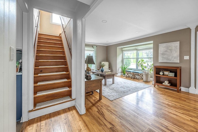 201 N Hillside Ter, Madison, WI 53705 - stairs featuring wood-type flooring, ornamental molding, baseboards, and recessed lighting