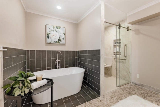 full bath with a marble finish shower, a freestanding bath, tile patterned flooring, tile walls, and crown molding