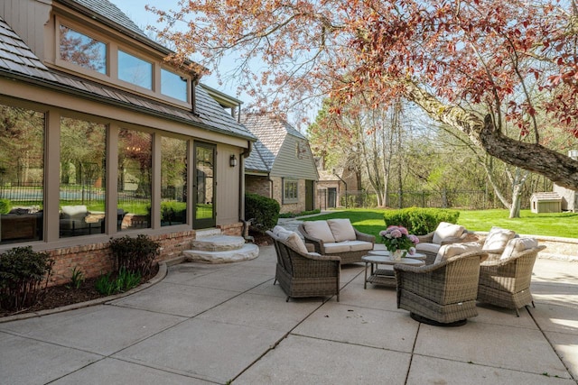 view of patio / terrace with fence and an outdoor hangout area