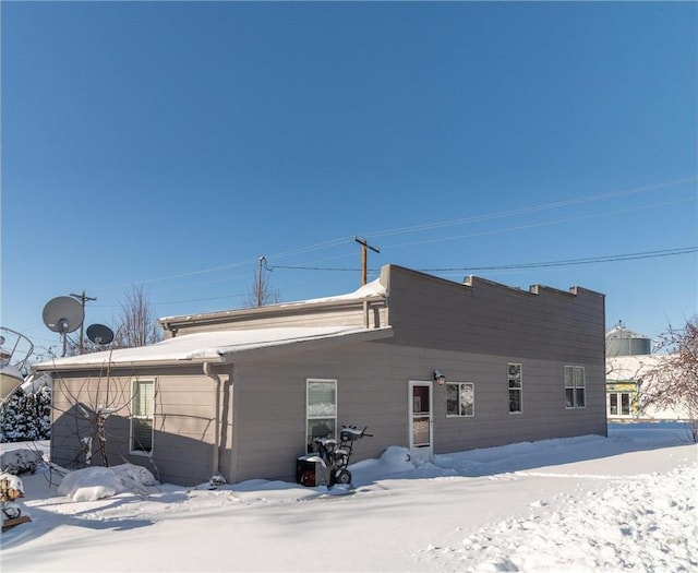 view of snow covered property