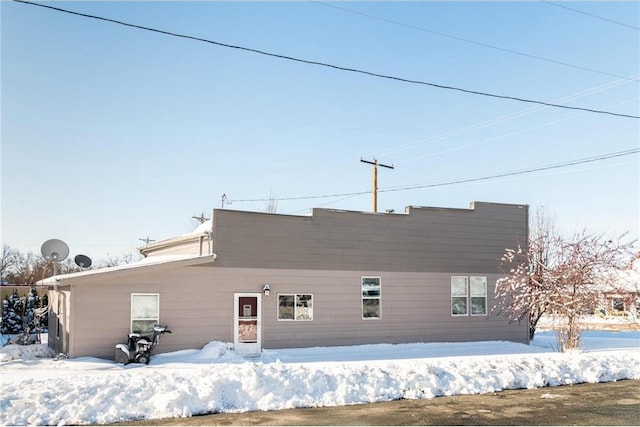 view of snow covered property