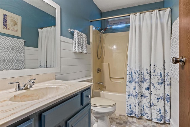 1074 E Queens Way, Nekoosa, WI 54457 - bathroom with a wainscoted wall, vanity, toilet, and shower / tub combo