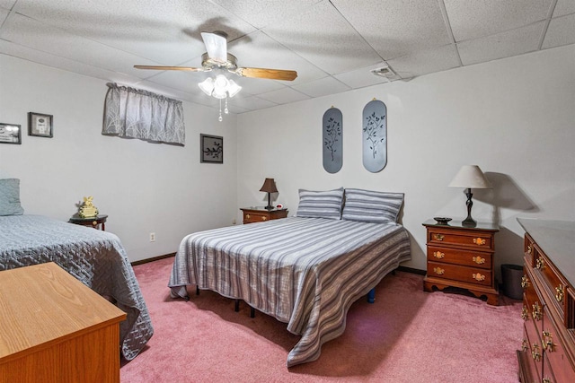 1074 E Queens Way, Nekoosa, WI 54457 - carpeted bedroom with ceiling fan, baseboards, and a drop ceiling