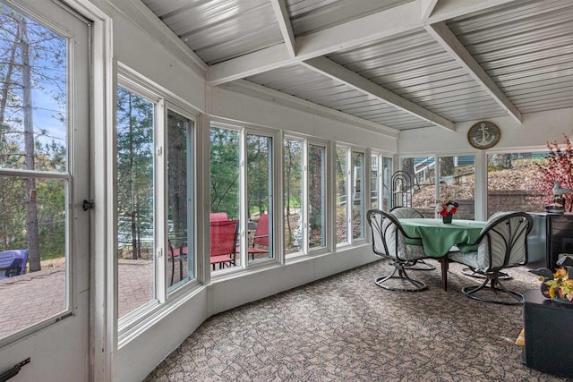 1074 E Queens Way, Nekoosa, WI 54457 - sunroom / solarium with a wealth of natural light, carpet flooring, and beam ceiling