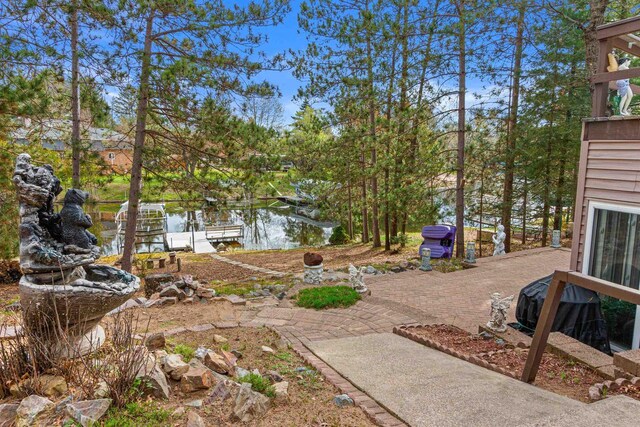 1074 E Queens Way, Nekoosa, WI 54457 - view of yard with a water view