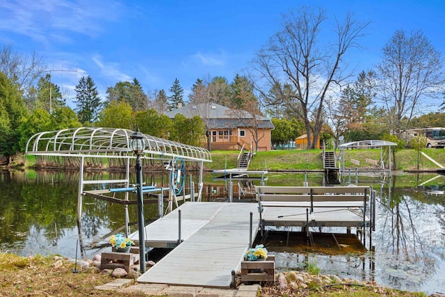 1074 E Queens Way, Nekoosa, WI 54457 - view of dock with a water view and boat lift
