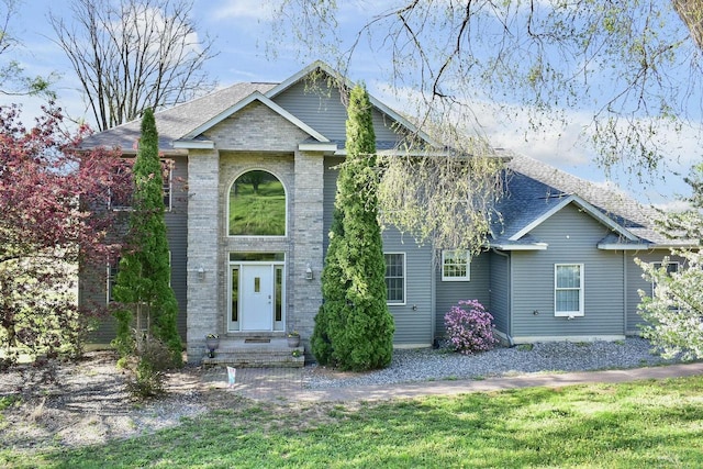 W157 Thomas Rd, Fountain City, WI 54629 - view of front of property featuring brick siding and roof with shingles