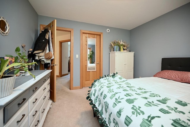 W157 Thomas Rd, Fountain City, WI 54629 - bedroom with light carpet and baseboards