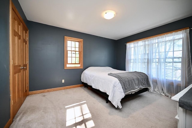 W157 Thomas Rd, Fountain City, WI 54629 - bedroom featuring carpet flooring and baseboards