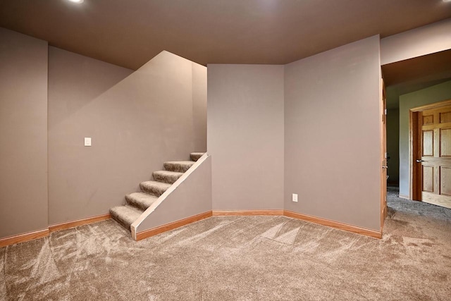 W157 Thomas Rd, Fountain City, WI 54629 - basement with carpet floors, baseboards, and stairs
