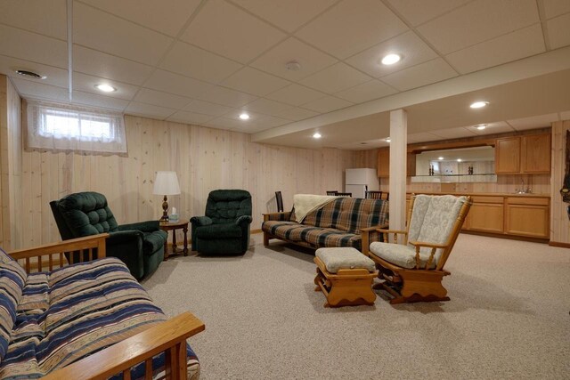 425 S Ventura Ln, Whitewater, WI 53190 - living area featuring light colored carpet, visible vents, and a drop ceiling