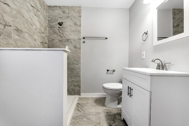 bathroom with toilet, baseboards, walk in shower, marble finish floor, and vanity