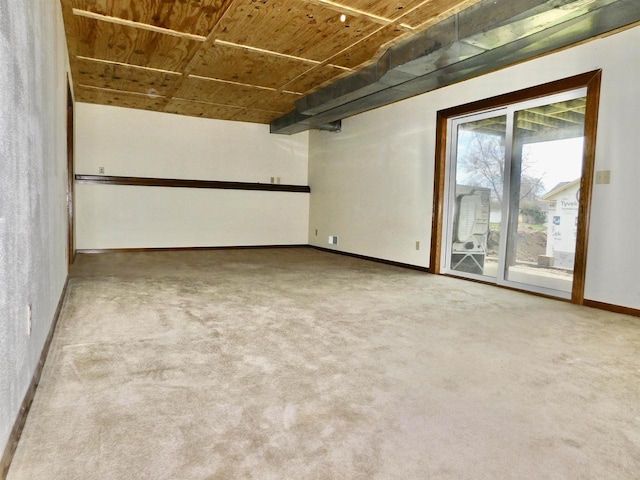 3241 Glendale Ave, Green Bay, WI 54313 - carpeted empty room with wooden ceiling and baseboards