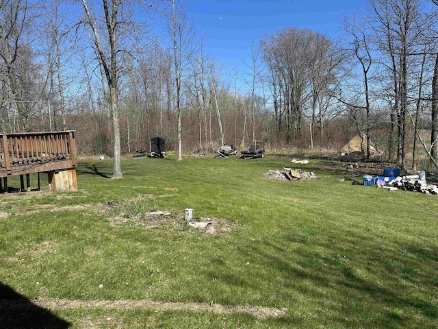 view of yard featuring a deck