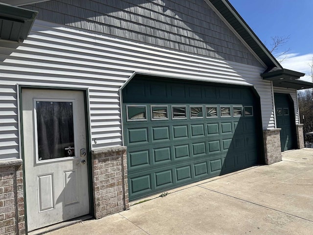 garage with driveway