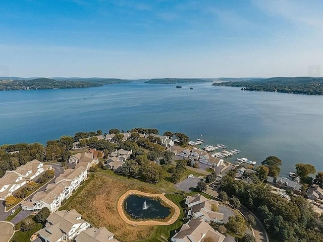 aerial view with a water view and a residential view