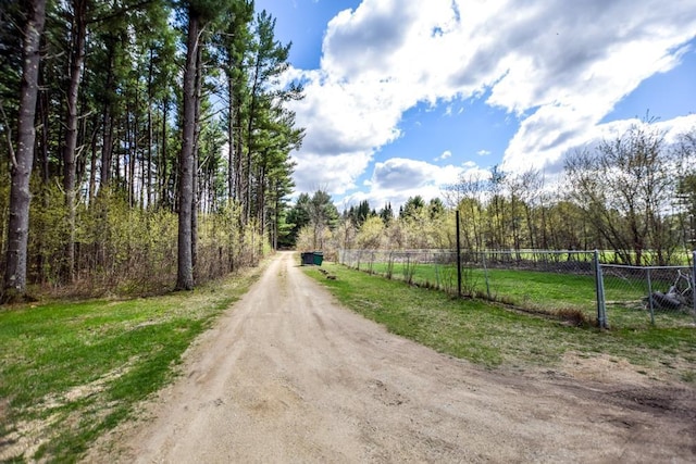 W4144 Fawn Ave, Montello, WI 53949 - view of dirt / gravel road featuring a forest view