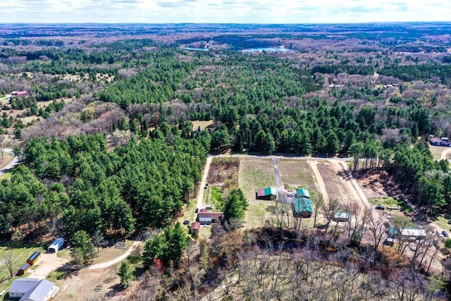 W4144 Fawn Ave, Montello, WI 53949 - aerial view of property and surrounding area featuring a heavily wooded area