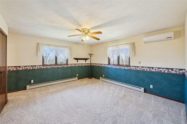 unfurnished room featuring a wall mounted air conditioner, a baseboard radiator, and a wainscoted wall