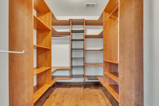 8408 N Lake Dr, Fox Point, WI 53217 - walk in closet with wood-type flooring and visible vents