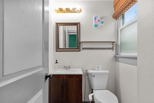 half bath with toilet and vanity