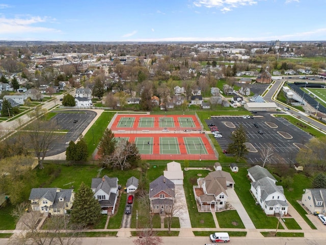 birds eye view of property with a residential view