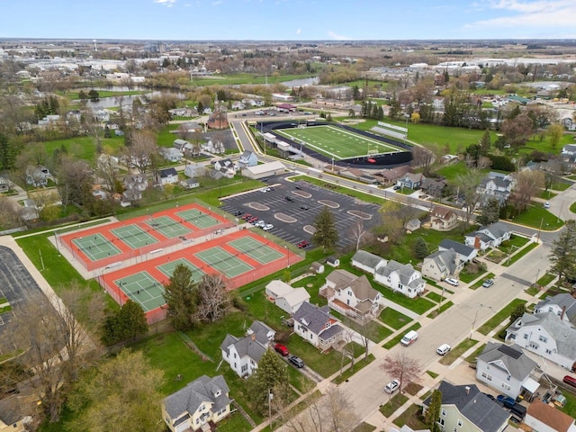 birds eye view of property featuring a water view and a residential view