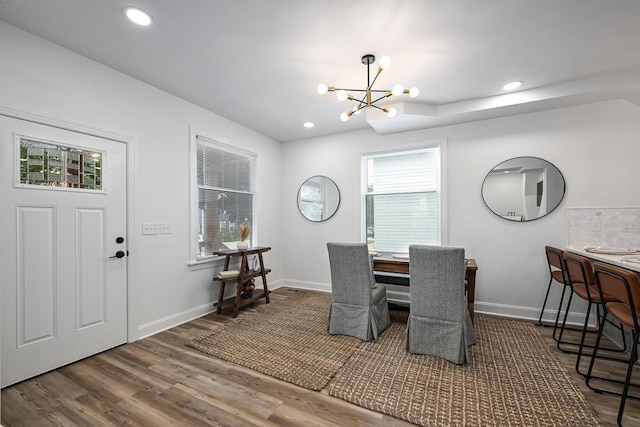 1928 E Iron St, Milwaukee, WI 53207 - dining space with an inviting chandelier, wood finished floors, baseboards, and recessed lighting