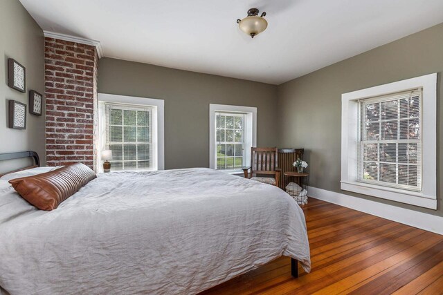 320 W Harrison St, Shullsburg, WI 53586 - bedroom featuring baseboards and wood finished floors