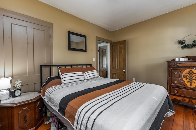 320 W Harrison St, Shullsburg, WI 53586 - bedroom with dark wood-style floors