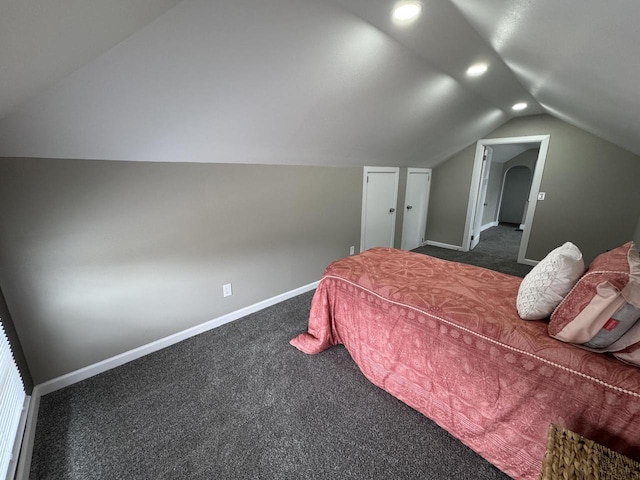 carpeted bedroom featuring lofted ceiling, baseboards, and recessed lighting