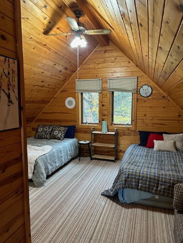 W15560 Mckinley Ln, Athelstane, WI 54104 - bedroom with vaulted ceiling, wooden ceiling, wood walls, and carpet floors