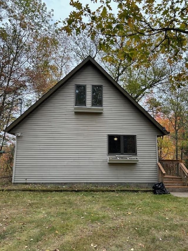 W15560 Mckinley Ln, Athelstane, WI 54104 - view of side of property with a yard