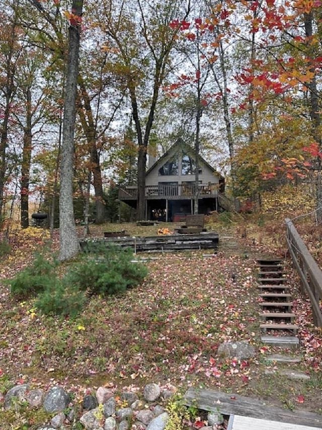 W15560 Mckinley Ln, Athelstane, WI 54104 - view of yard with stairs and a wooden deck