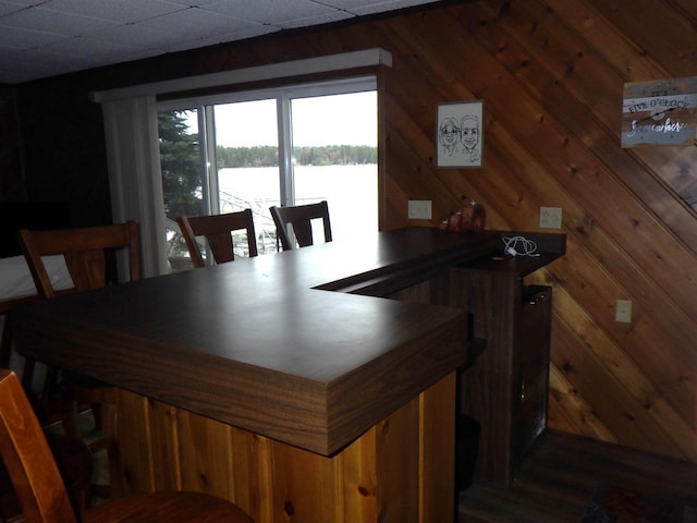 N2646 Rustic Cir, Clintonville, WI 54929 - dining space featuring a water view and wooden walls