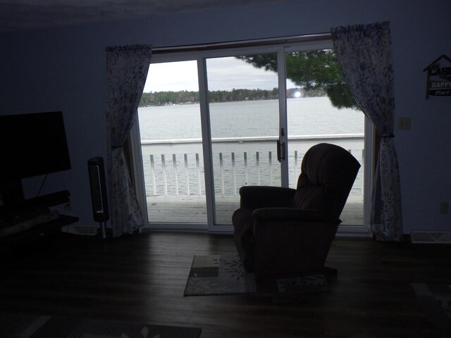 N2646 Rustic Cir, Clintonville, WI 54929 - living area featuring wood finished floors and a water view