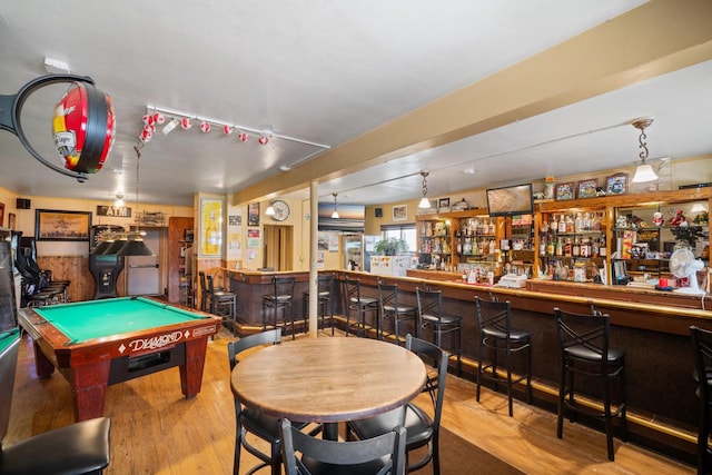 3423 S Clement Ave, Milwaukee, WI 53207 - recreation room with a bar, billiards, and wood finished floors