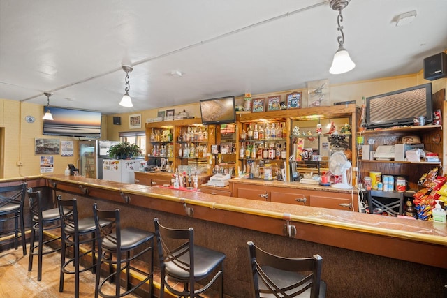 3423 S Clement Ave, Milwaukee, WI 53207 - bar with wet bar and hanging light fixtures
