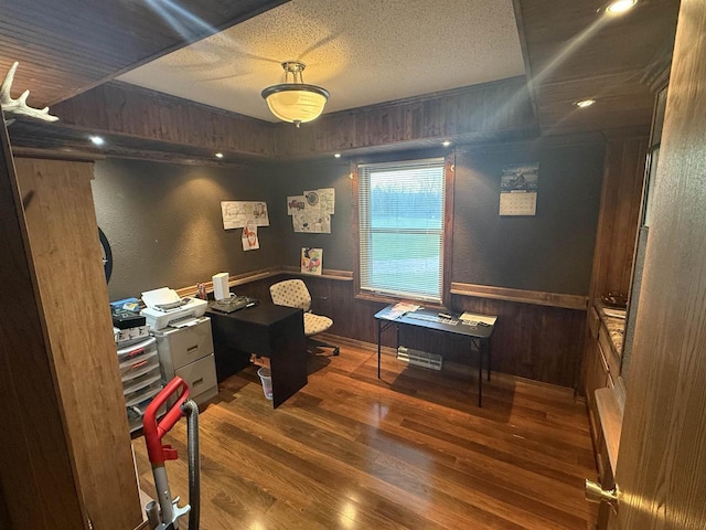 W5417 Volling Ln, Mauston, WI 53948 - home office featuring wood finished floors, wainscoting, wooden walls, a textured ceiling, and a textured wall