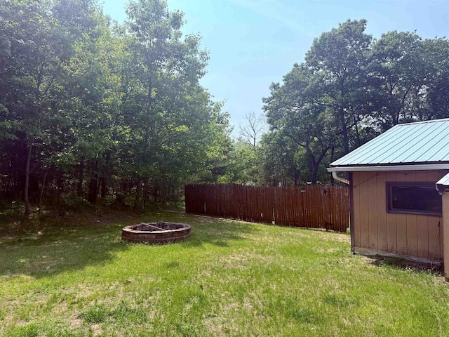 W5417 Volling Ln, Mauston, WI 53948 - view of yard with an outdoor fire pit