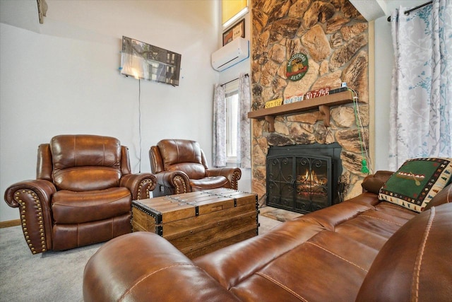 11 Fir Trl, Wisconsin Dells, WI 53965 - living area featuring carpet floors, a stone fireplace, and an AC wall unit