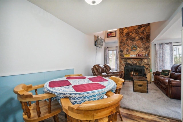 11 Fir Trl, Wisconsin Dells, WI 53965 - dining space with lofted ceiling and a fireplace
