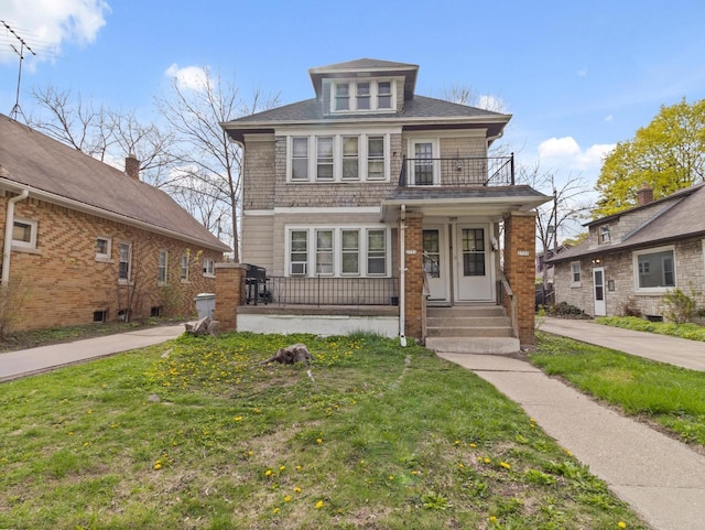 2753 N 60th St Unit 2755, Milwaukee, WI 53210 - american foursquare style home with a shingled roof, a porch, a front yard, and a balcony