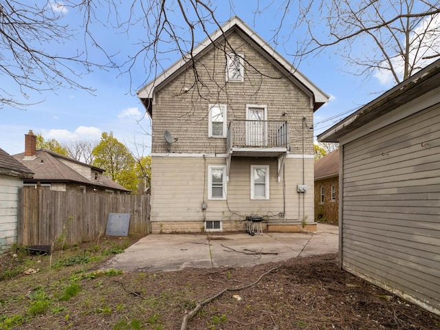 2753 N 60th St Unit 2755, Milwaukee, WI 53210 - rear view of house featuring a patio, fence, and a balcony