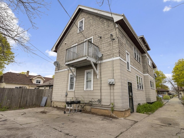 2753 N 60th St Unit 2755, Milwaukee, WI 53210 - exterior space with a balcony and fence