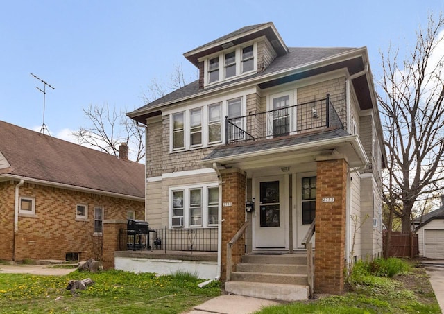 2753 N 60th St Unit 2755, Milwaukee, WI 53210 - american foursquare style home featuring roof with shingles and a balcony